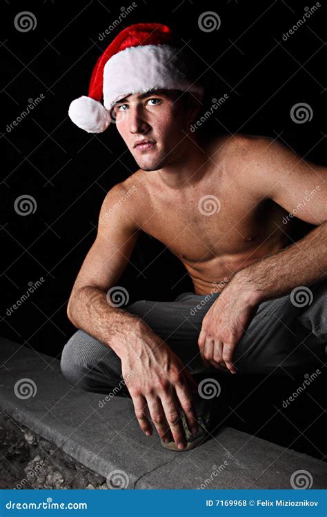 Man In A Santa Hat Stock Photo Image Of Wearing Shirtless 7169968