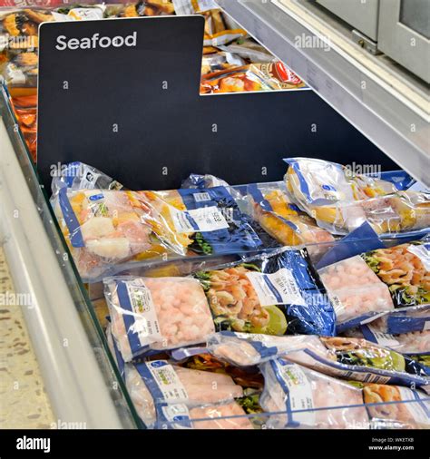 Close Up Of Seafood Sign In Frozen Food Supermarket Store Self Service