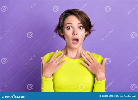 Photo Of Funny Surprised Girl Wear Trendy Yellow Shirt Palms Touch Chest Unexpected Reaction