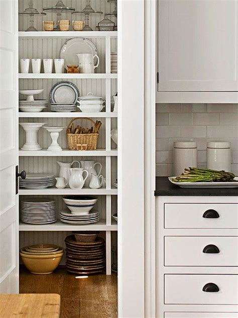 This tall white pantry cabinet with shelves is simply perfect for traditional kitchens. 20 Smart White Kitchen Pantry Cabinets - Rilane