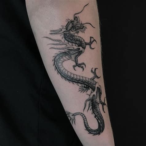 Cool Dragon Tattoo By Edtaemets Tattoos Band Tattoo Top Tattoos