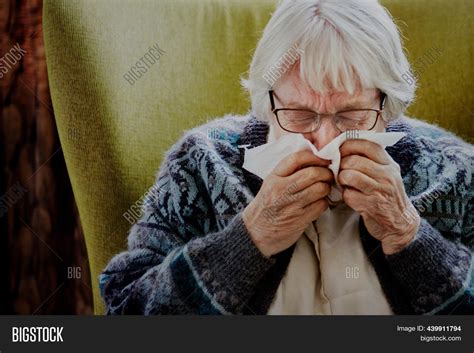 Senior Woman Sneezing Image And Photo Free Trial Bigstock