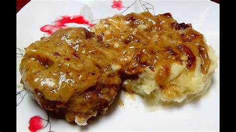 This is a recipe the family will love; Hamburger Steak with Creamy Onion Gravy - HeavenRecipes