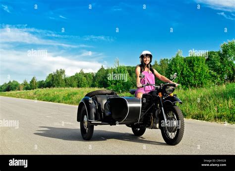 Pretty Woman Riding A Motorcycle With A Sidecar Stock Photo Alamy
