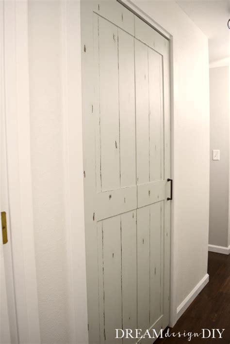 A repurposed bifold door project using vintage dressers to make faux built in bedroom shelving when i rescued 3 sets of these bifold doors from the dump last fall i knew i wanted to use them to. DIY Bifold Barn Door - Transform a Closet door for $15 with 1/4" Plywood
