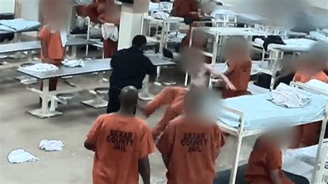 Watch Bexar County Detention Officer Pushes Inmate On Video