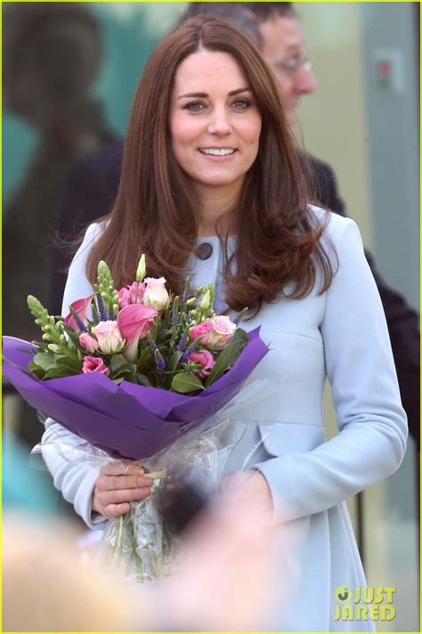 Kate Middleton Cradles Her Growing Baby Bump At The Kensington Leisure