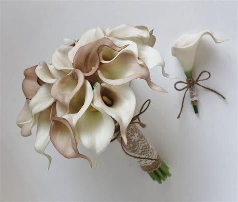 A brilliant cally lily bouquet of mauve mini cala lilies with a purple ribbon. Wedding Bouquet, Bridal Bouquet, Ivory Beige Calla Lily ...