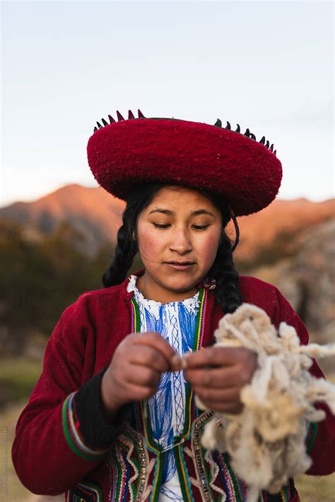 Peruvian Weavers In Traditional Clothes By Stocksy Contributor Kike