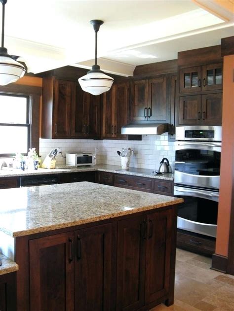 These ideas will help you do it the right way. white subway tile with gray grout with dark cabinets ...