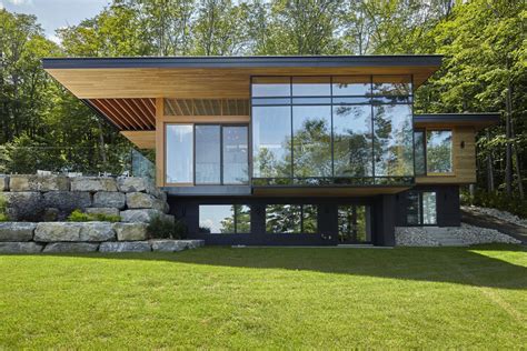 Modern Lakeside Cottage With Douglas Fir Wood Ceilings And Large Roof