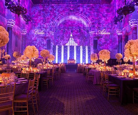 The square cake was decorated with blueberries and granadilla in minimalist fashion. Held at Cipriani in New York City, this glamorous purple, white and gold wedding by Colin Cowie ...