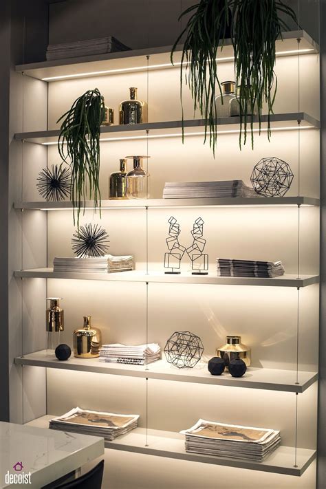 Rows of shelves can often look dark and cluttered. 50 Beautiful Wall Shelf Designs And lighting Ideas - Decor ...