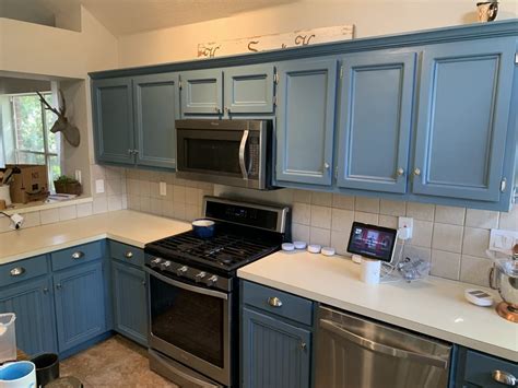 The kitchen cabinet out and about across the uk. Kitchen Cabinet Repaint - From Tan To Blue | SurePro Painting