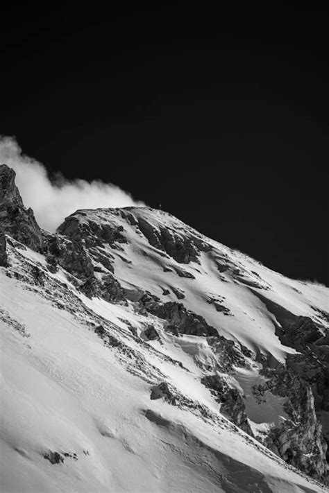 Grayscale Photo Of Snow Covered Mountain · Free Stock Photo