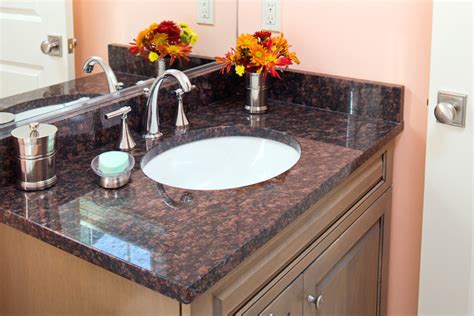 Granite countertop warehouse offers discounted granite and fabrication including granite slabs, backsplashes and design for kitchen counters. Tan Brown Granite Vanity - Traditional - Bathroom - Boston