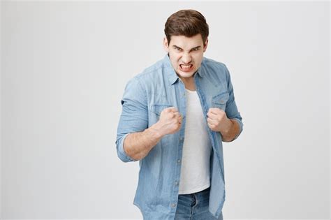 Free Photo Angry Aggressive Man Prepare For Fight Clenching Fists