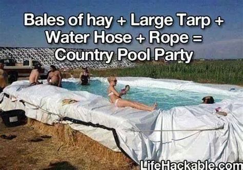 Some People Are In The Water And One Is Laying On A Hay Bale While
