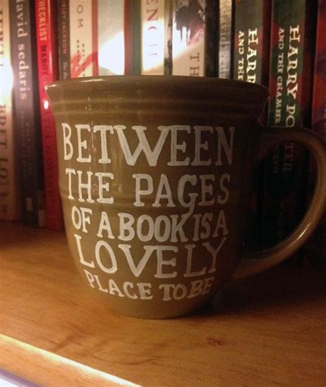 between the pages of a book is a lovely place to be mug mugs book nerd good romance books