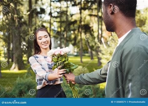 Man Giving Flowers For His Beautiful Girlfriend Stock Image Image Of Happy Anniversary 113500571