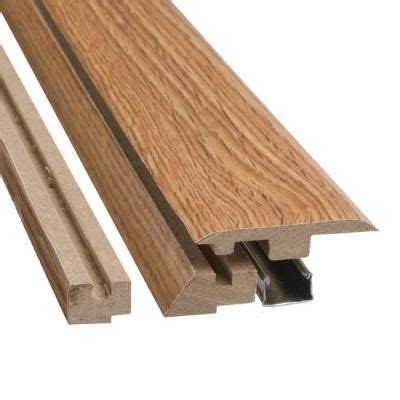 This transition comes complete with track and fasteners to secure to floor and includes spacers that adapt. Pergo Four-In-One (4-in-1) Molding Transitions with ...