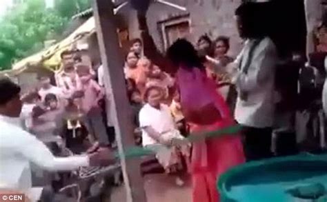 Indian Husband Shown Tying Up His Cheating Wife And Her Lover Before Beating Them Daily Mail