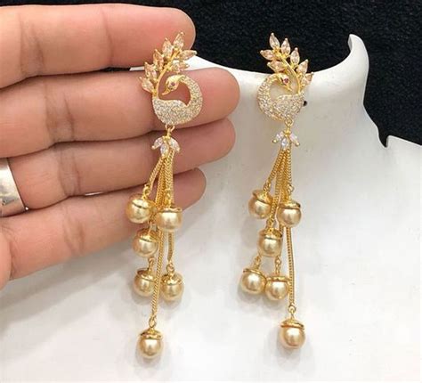 gold jhumkas long earrings daily wear earrings collection gold hoop earrings earring… gold
