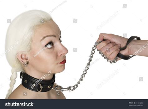 Sexy Blond Woman With Leather Collar And Leash Holding By Males Hand