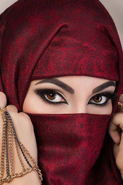 Portrait Of Beautiful Arabian Girl Hiding Her Face Behind Red Niqab Beautiful Eyes Beauty