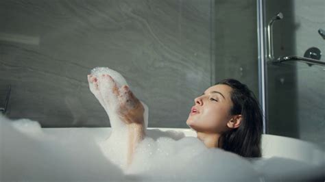 Portrait Of Smiling Woman Taking Bubble Bath In Modern Interior Sexiz Pix