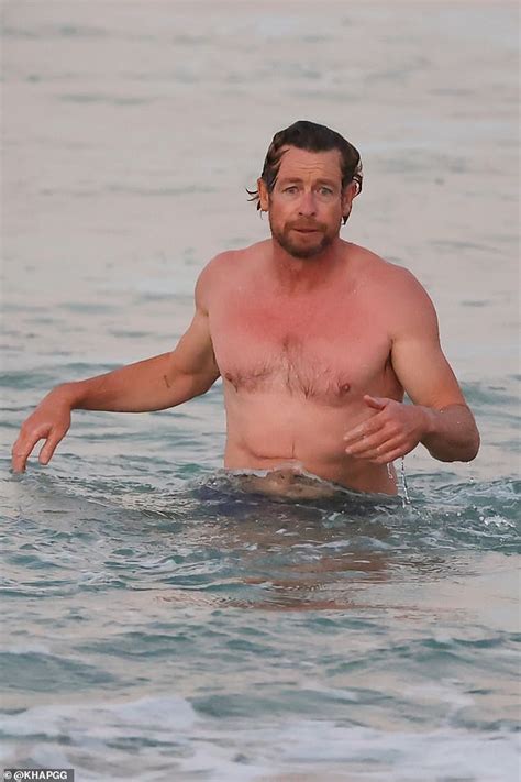 Shirtless Simon Baker Looks Freezing As He Goes For A Swim And