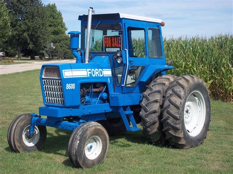 Blue Tudor Cab Ford 8600 Tractor