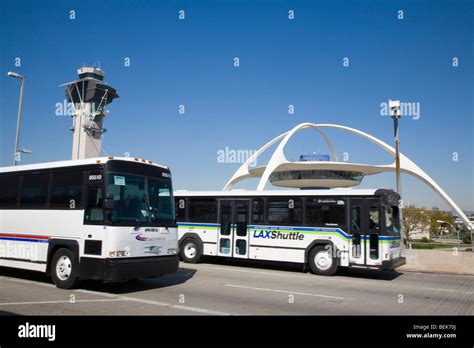 Two buses against blue sky. LAX (Los Angeles International Airport