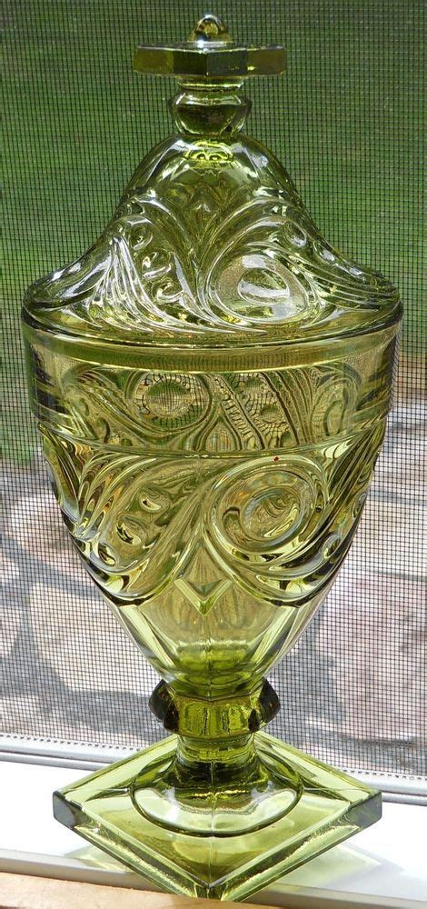 Inspired by vintage sweet shop canisters, our whimsical jars keep irresistible treats in clear view. Heisey Ipswich Imperial Glass Co. tall covered candy jar ...