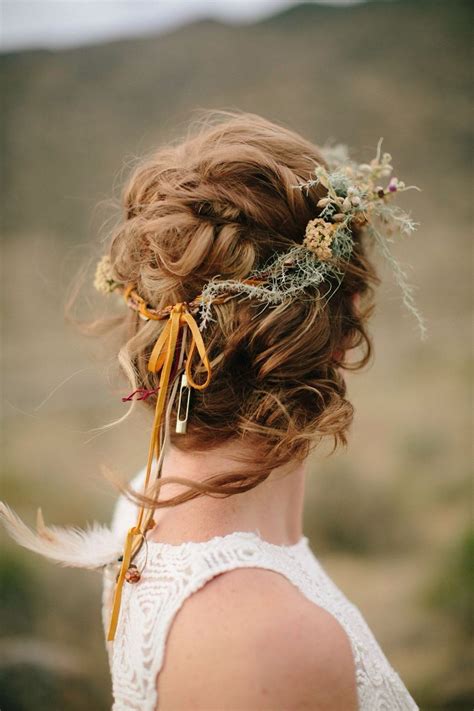 messy updo with custom floral crown boho wedding hair by heather chapman photo k mari