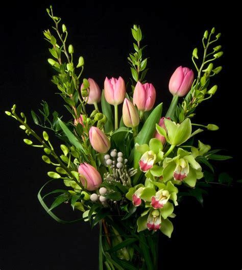 This Is An Arrangement Featuring Green Cymbidium Orchids And Pink Tulips See Our Entire