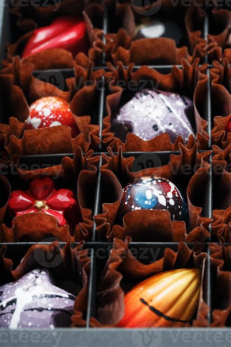 Colorful Handmade Chocolates In A Box On A Dark Background Stock Photo At Vecteezy