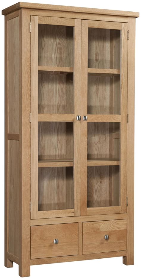 Virtually all cabinet door styles we offer can be made in a glass cabinet door option. Abbey Oak Display Cabinet with Glass Doors