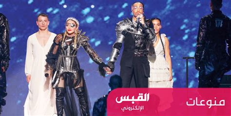 هذا المقال يتضمن أسماءً أعجمية تتطلب حروفاً إضافية (پ چ ژ گ ڤ ڠ).لمطالعة نسخة مبسطة، بدون حروف إضافية. مادونا «ترفع» علم فلسطين في قلب تل أبيب