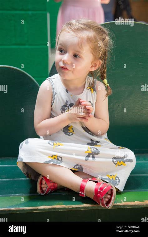 Little Girl Sitting Cross Legged Hi Res Stock Photography And Images