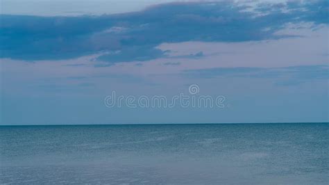 White Clouds Float In The Sky Over The Sea Coast Stock Image Image Of