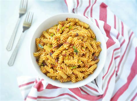 Italians originally dried tomatoes on their ceramic rooftops. Pasta with Spicy Sun Dried Tomato Pesto - Ruchiskitchen