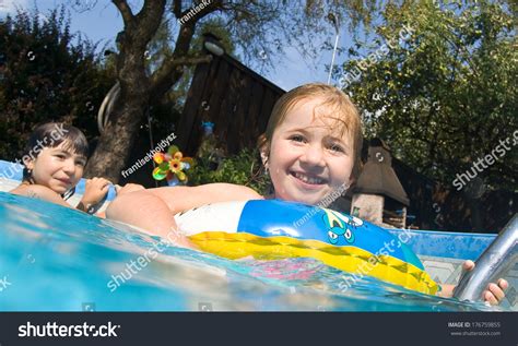 Two Little Girls Swim Pool Stock Photo 176759855 Shutterstock