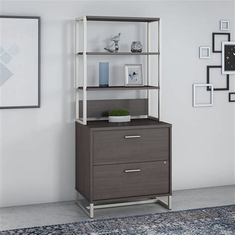 Pairing a steel frame with wooden drawers, this filing cabinet offers the appeal of industrial design while keeping your important documents organized and safely stored away. Office by kathy ireland Method 2 Drawer Lateral File ...