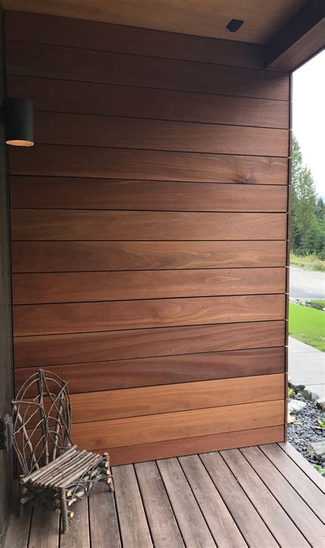 Beautiful Batu Mahogany Hardwood Siding On This Home Carries Into The