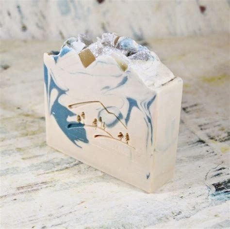 A Soap Bar Sitting On Top Of A Wooden Table