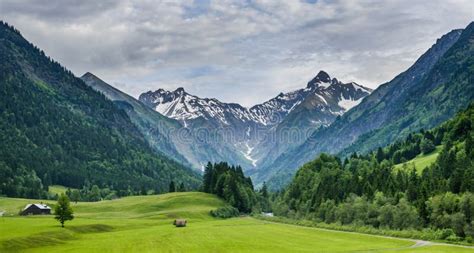 Lush Green Valley Surrounded By Alps Stock Image Image Of Destination