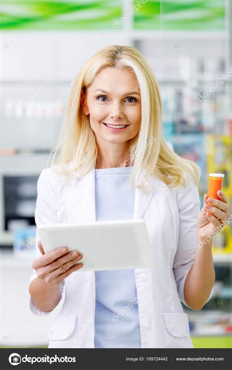 Pharmacist With Digital Tablet And Medication — Stock Photo