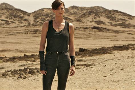 with the old guard charlize theron continues her reign as hollywood s top action star