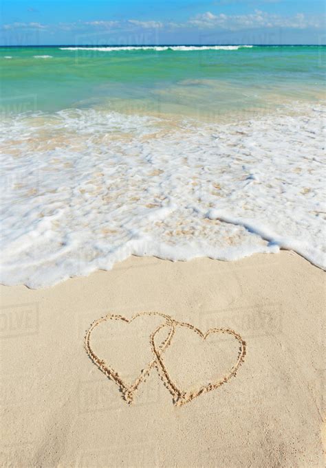 Heart Drawing In Sand On Beach Stock Photo Dissolve